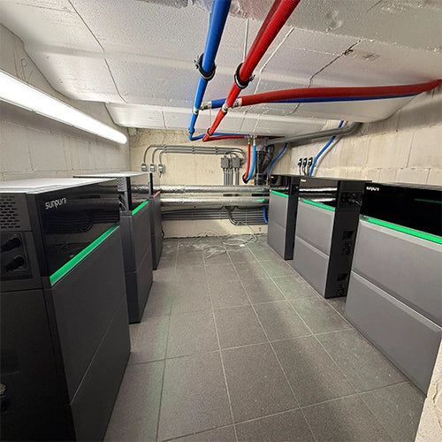 Multiple Sunpura battery systems installed in a plant room